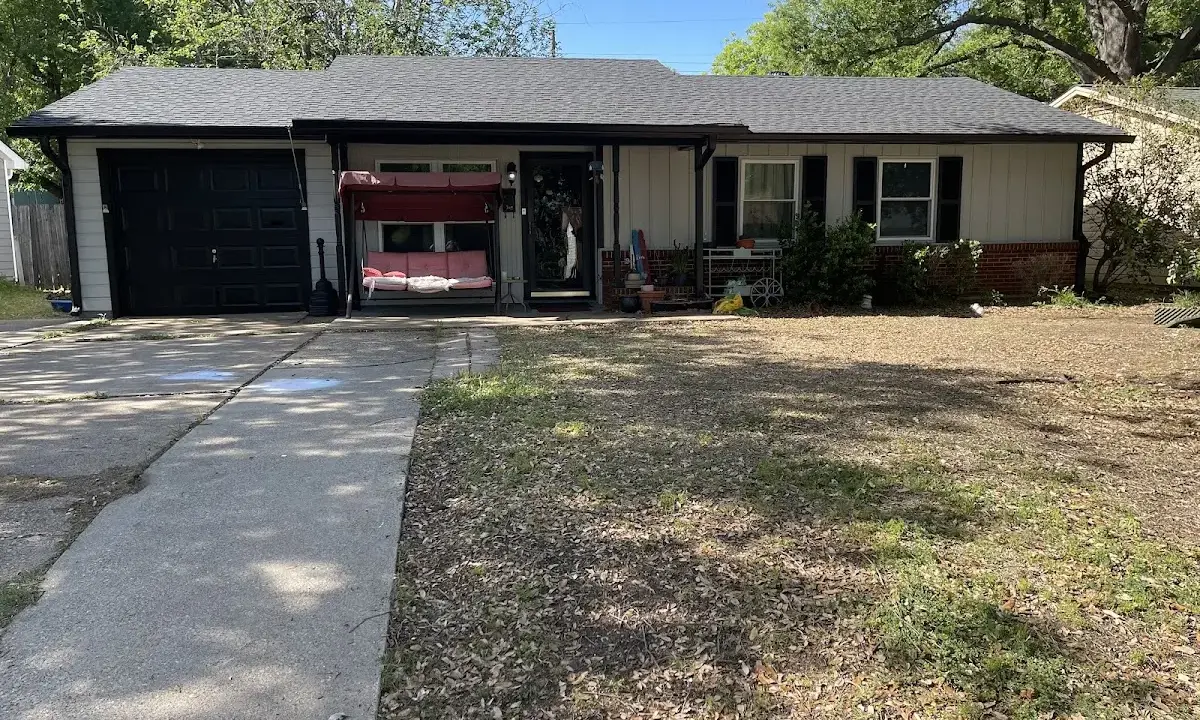 Soffit & Fascia Repair crew at work on a residential roof in DeRidder